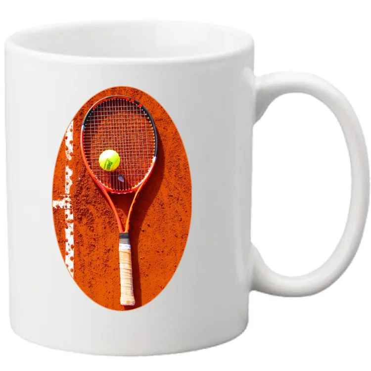 tennis racket with ball on clay court