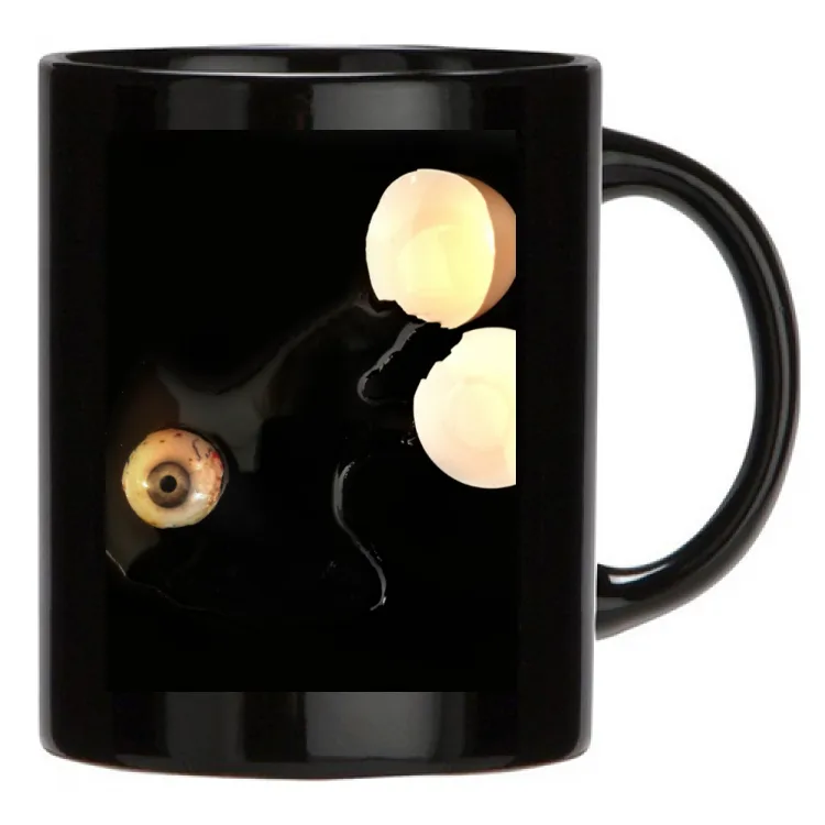 Tazza nera uovo occhio